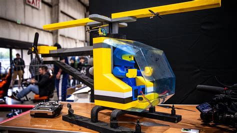 giant flying lego helicopter    functional drone shouts
