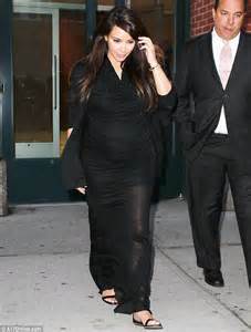 Kim Kardashian Reveals A Very Burgeoning Belly In Sheer