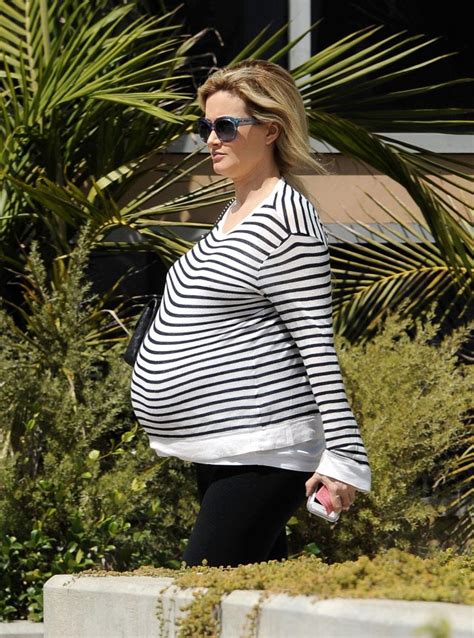 ready to pop very pregnant holly madison waddles her way to the hospital