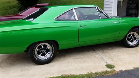 sold beautiful synergy green  plymouth road runner  sold