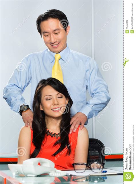 asian colleagues having office affair stock image image
