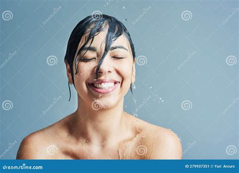 Beauty Water Splash And Face Of Woman Shower On Blue Background For