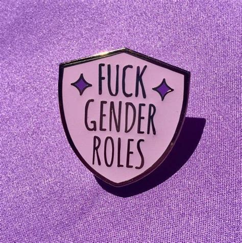 a pin with the words fock gender roles on it