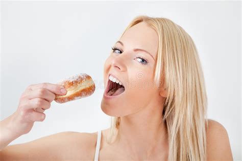 beautiful woman eating tasty donut stock image image of background hungry 23254777