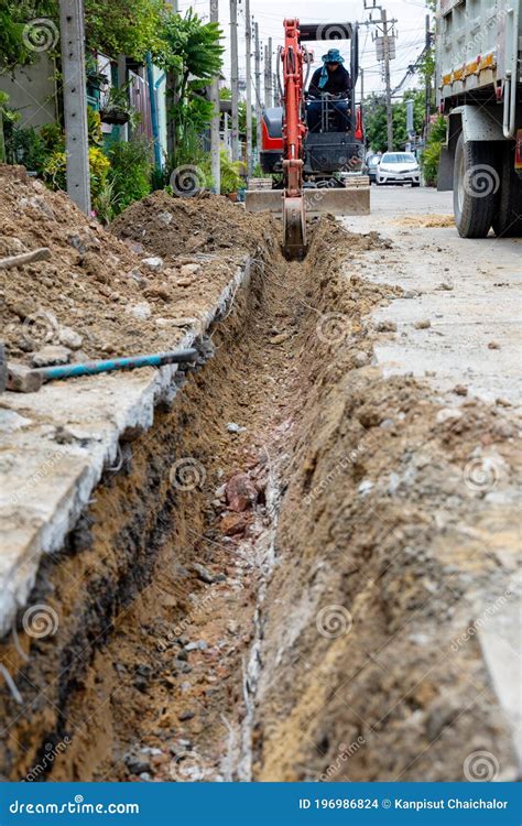 digging road  install pipe water excavation water drainage