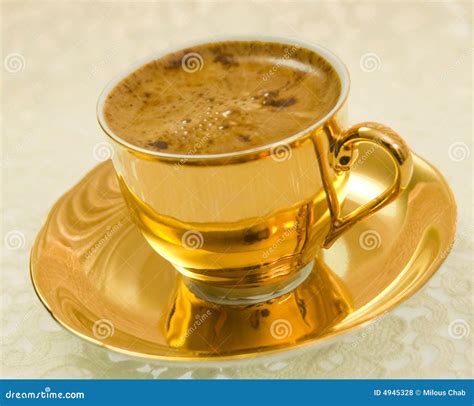 golden coffee cup royalty  stock  image