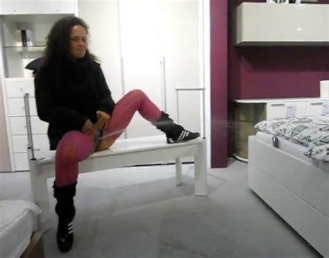 naughty german beauty peeing in the furniture store