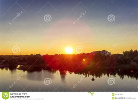hot evening sun in panorama landscape sunset on river