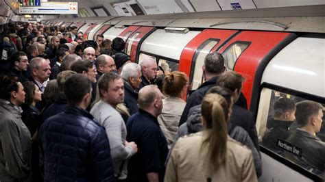 london commuters face rush hour chaos as three tube lines part