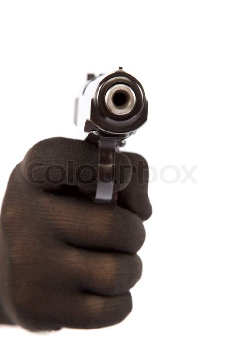 Hand In Black Glove Holding A Gun On A White Background