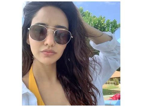 Neha Sharma Teases Fans With A Throwback Picture From Her Beach Getaway