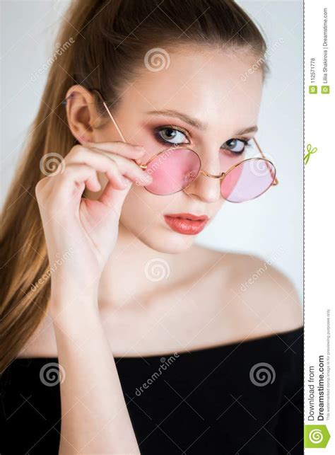 Blonde Woman In Pink Glasses On White Background Beautiful Girl With