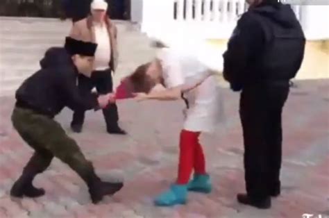 Pussy Riot Members Whipped By Russian Cossacks In Sochi