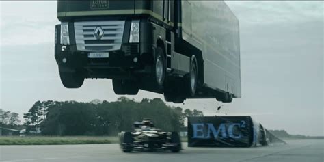 the lotus f1 team jumped a semi truck over one of their race cars