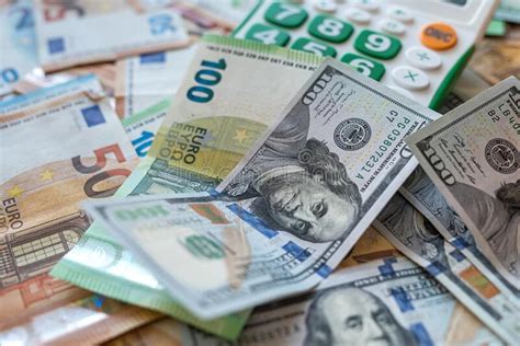 calculator  dollar   euro bills exchange money stock photo image  banknote success