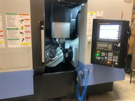 axis machine  cnc milling    level metco engineering