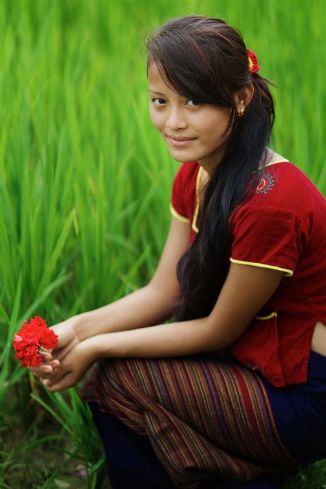 Thaman Nepali Girl With Flower Chitwan National Parc Terai Nepal