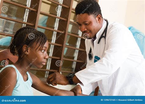 doctor  treating  patient   office   hospital stock image