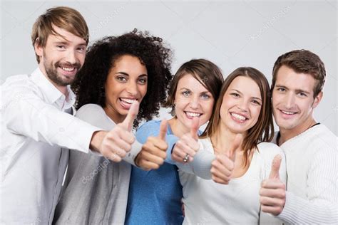 Enthusiastic Group Of People Giving A Thumbs Up — Stock