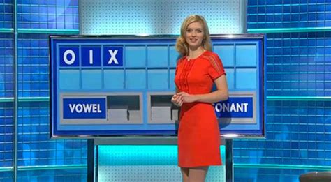 rachel riley flaunts major cleavage as she oozes sex appeal in skintight scarlet dress