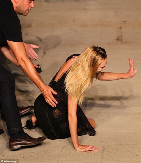 candice swanepoel takes a fall down the givenchy ss16 nyfw