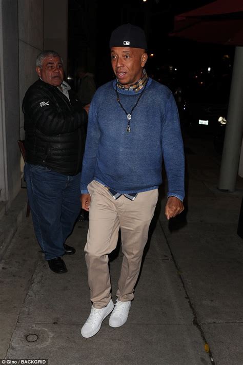 accused rapist russell simmons kisses his date outside la hot spot daily mail online