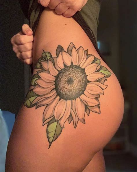 sunflower hip tattoo in 2021 hip tattoo hip thigh tattoos thigh