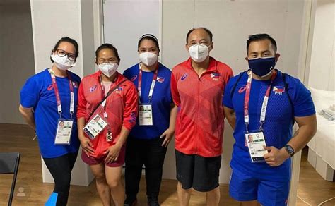 hidilyn diaz s chinese coach bares mixed feelings after