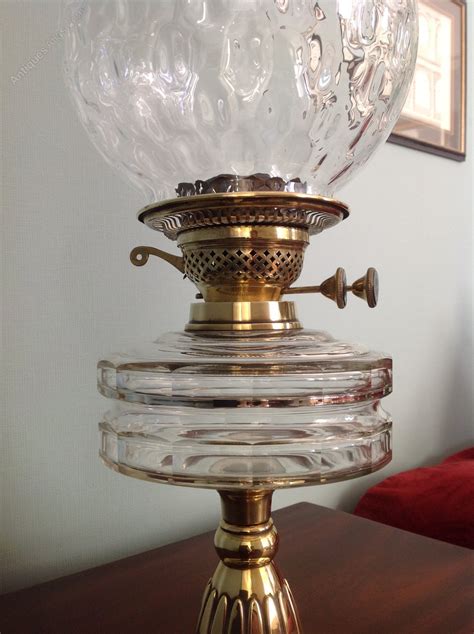 antiques atlas victorian   brass oil lamp  glass globe