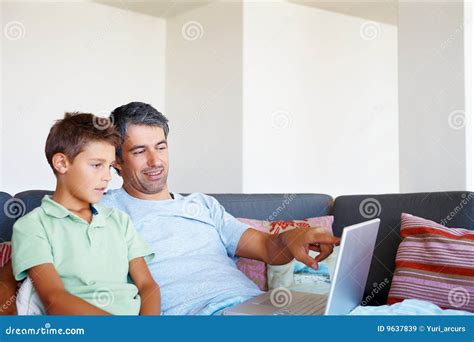 royalty  stock images father teaching  son    laptop image