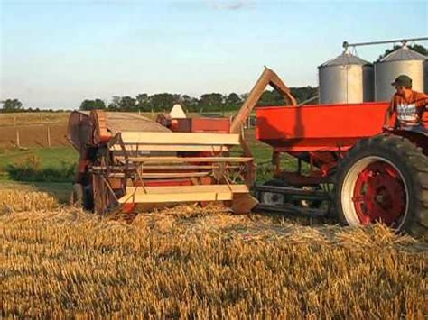 ih   ih  pull type combine harvesting wheat unloading youtube