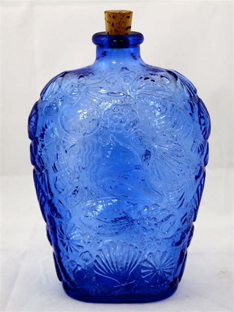 elegant cobalt blue glass bottle  seashell design