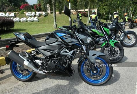 kawasaki unveils   abs   abs se  straits times malaysia general business