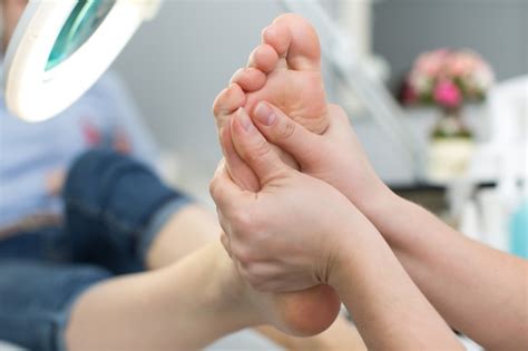 premium photo close    foot massage   spa