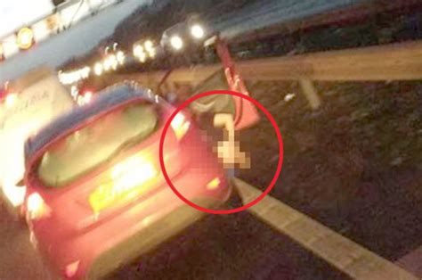 Traffic News Woman Caught Taking A Pee In Public While Stuck In M1