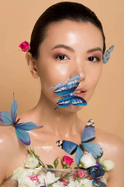 beautiful nude asian girl flowers butterflies body isolated beige stock