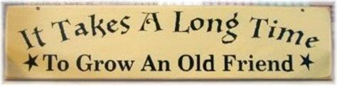 it takes a long time to grow an old friend by woodsignsbypatti