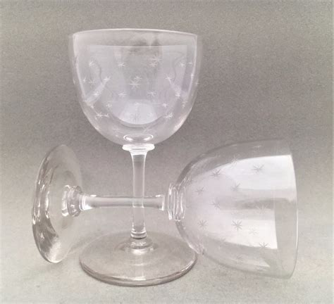 a pair of victorian star etched dessert wine glasses 482860