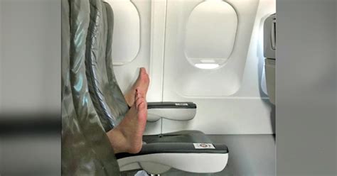 photo of barefoot space invader on sfo bound flight goes viral cbs