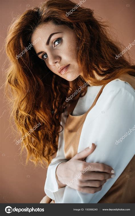 Woman Long Red Hair Beige Dress Looking Camera Isolated Brown Stock