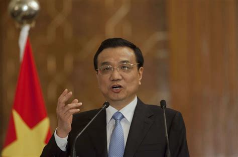 china s li keqiang opposes eu moves against telecom and solar firms