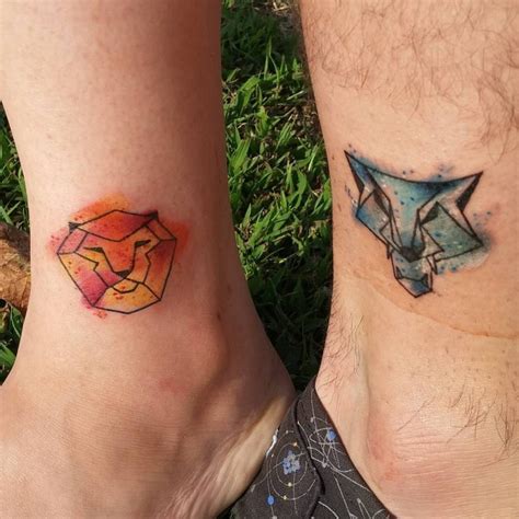 Lion And Wolfs Heads Couple Or Friendship Geometrical Tattoo On Ankle