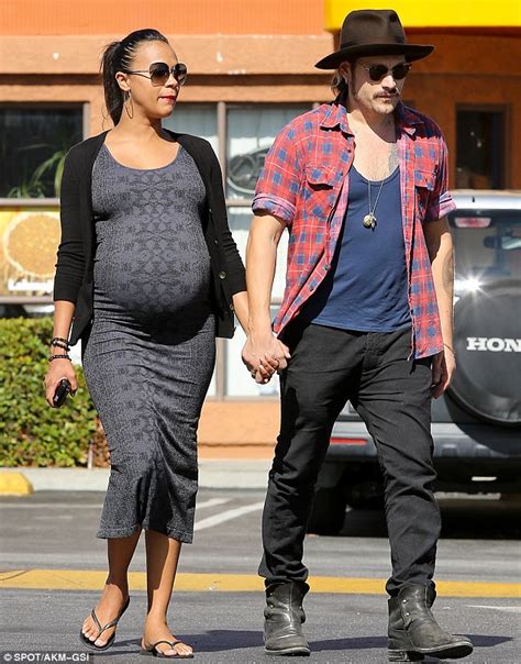 pregnant zoe saldana shows belly on date with husband marco perego