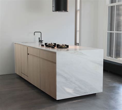 unique marble kitchen    bianco lasa marble  kichten