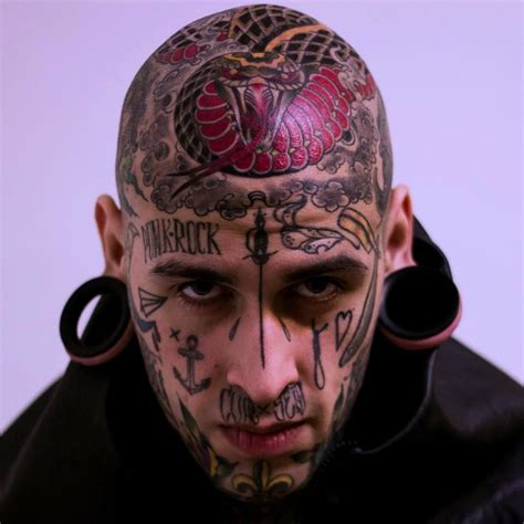 punkerskinhead face tattoos tattoos stretched ears