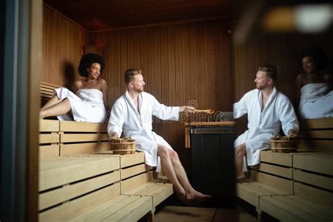 Happy Couple Enjoying The Sauna Together At The Spa Stock Image Image
