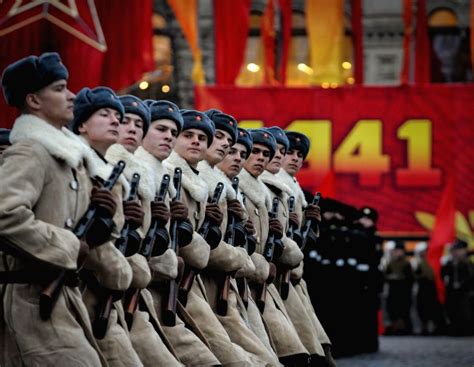 Soldiers In Historical Uniforms Take Part In A Military Parade In The