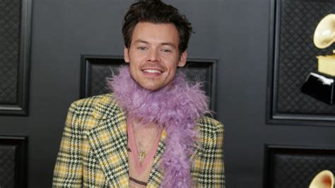 Harry Styles Gets Feathered Boas Trending Thanks To Eclectic Grammys