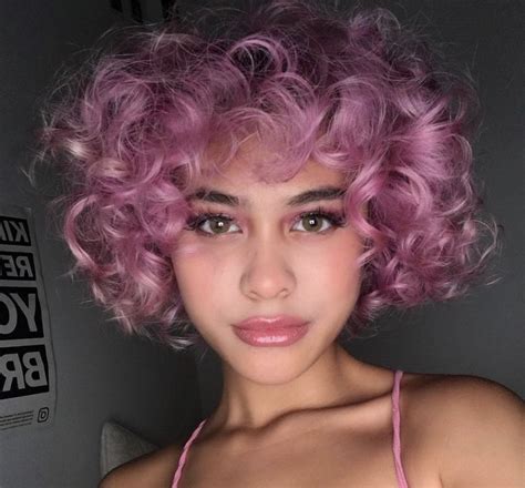 pin by 𝓷𝓲𝓸𝓶𝓲 on hair curly pink hair dyed curly hair