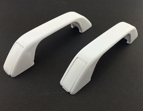 white plastic grab handle pair transport hardware